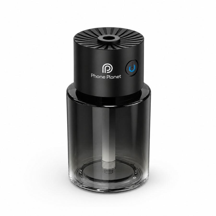 Starry Sky Auto Aroma Diffuser auf einem Wohnzimmertisch mit feinem Duftnebel
